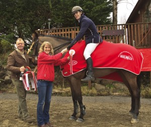 From left Charles Hanley of Claremorris Equitation Centre and Nia O'Malley representing sponsor Connolly's RED MILLS with Liam O Meara and Mr Coolcaum winners of the Claremorris Auctions sponsored sixth round of the HSI/Connolly’s RED MILLS Spring Tour at Claremorris Equestrian Centre, photo credit Monica Flanagan)